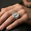 Load image into Gallery viewer, Polished silver mermaid ring on hand, lifestyle framing, engraved band and mermaid relief clearly visible, premium look
