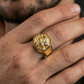 Load image into Gallery viewer, Octagon Foo Dog signet ring in a gold plated finish worn on finger, octagonal face with Chinese guardian lion motif, masculine lifestyle close-up

