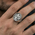 Load image into Gallery viewer, Freya ring in polished silver finish on finger, Norse mythology goddess engraving, natural lifestyle wear shot
