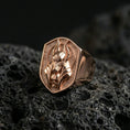 Load image into Gallery viewer, Anubis jackal head ring in a rose gold plated finish on volcanic rock, bold Egyptian protection symbol with sculpted faceplate, high-end close-up
