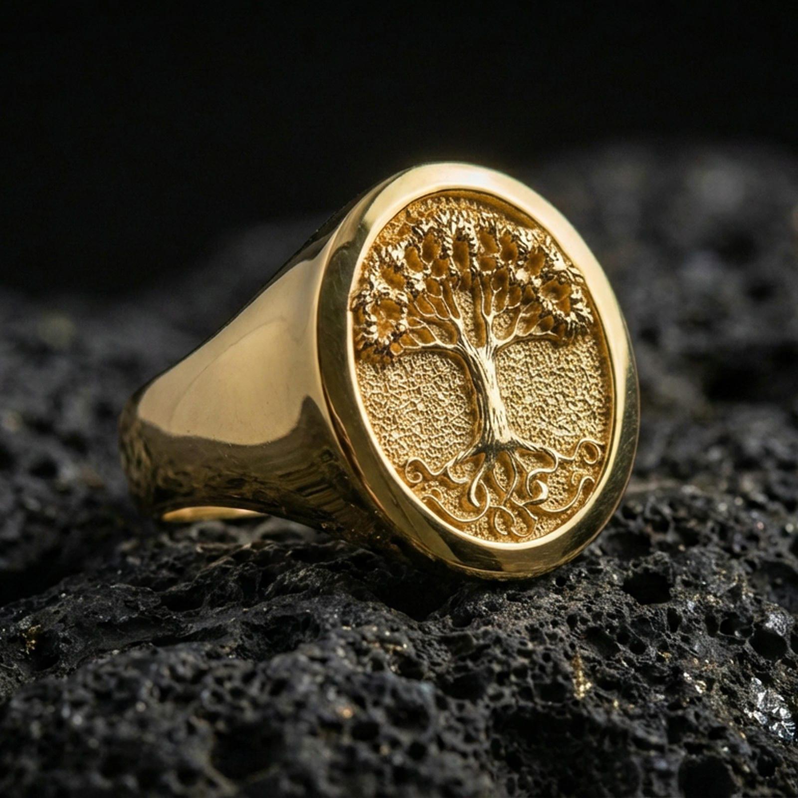 Tree of Life signet ring in gold finish on volcanic rock, high-shine Yggdrasil engraving, crisp macro shot