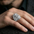 Load image into Gallery viewer, Polished silver Hephaestus ring on hand, minimalist-strong signet profile with high-relief Greek god of fire design
