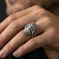 Load image into Gallery viewer, Polished silver Zeus ring on finger showcasing sculpted hair and beard details, clean lifestyle wear photo with natural lighting
