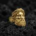 Load image into Gallery viewer, Gold plated Zeus mythology ring featuring classical god portrait and deep relief carving, premium studio macro on black volcanic rock surface

