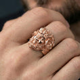 Load image into Gallery viewer, Rose gold plated Czernobog ring on finger featuring horned deity portrait, refined fantasy jewelry lifestyle wear shot
