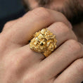 Load image into Gallery viewer, Gold plated Czernobog signet ring worn on finger, statement dark mythology jewelry inspired by Slavic legends, premium lifestyle close-up
