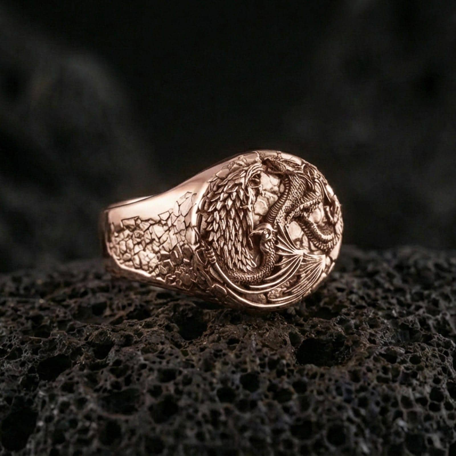Rose gold plated wolf and dragon ring on black volcanic stone, mythical wolf dragon motif, statement fantasy ring