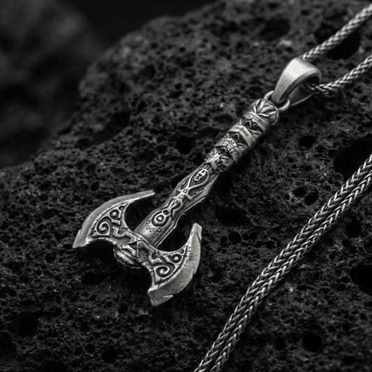 Oxidized sterling silver Viking labrys axe necklace pendant on black volcanic stone, engraved double-headed axe, braided chain