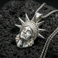 Load image into Gallery viewer, Polished sterling silver Statue of Liberty pendant on black volcanic stone, New York City charm, braided chain necklace
