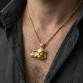 Load image into Gallery viewer, Gold plated Hypnos pendant necklace worn on neck, premium lifestyle composition, Greek god of sleep design with sculpted wing
