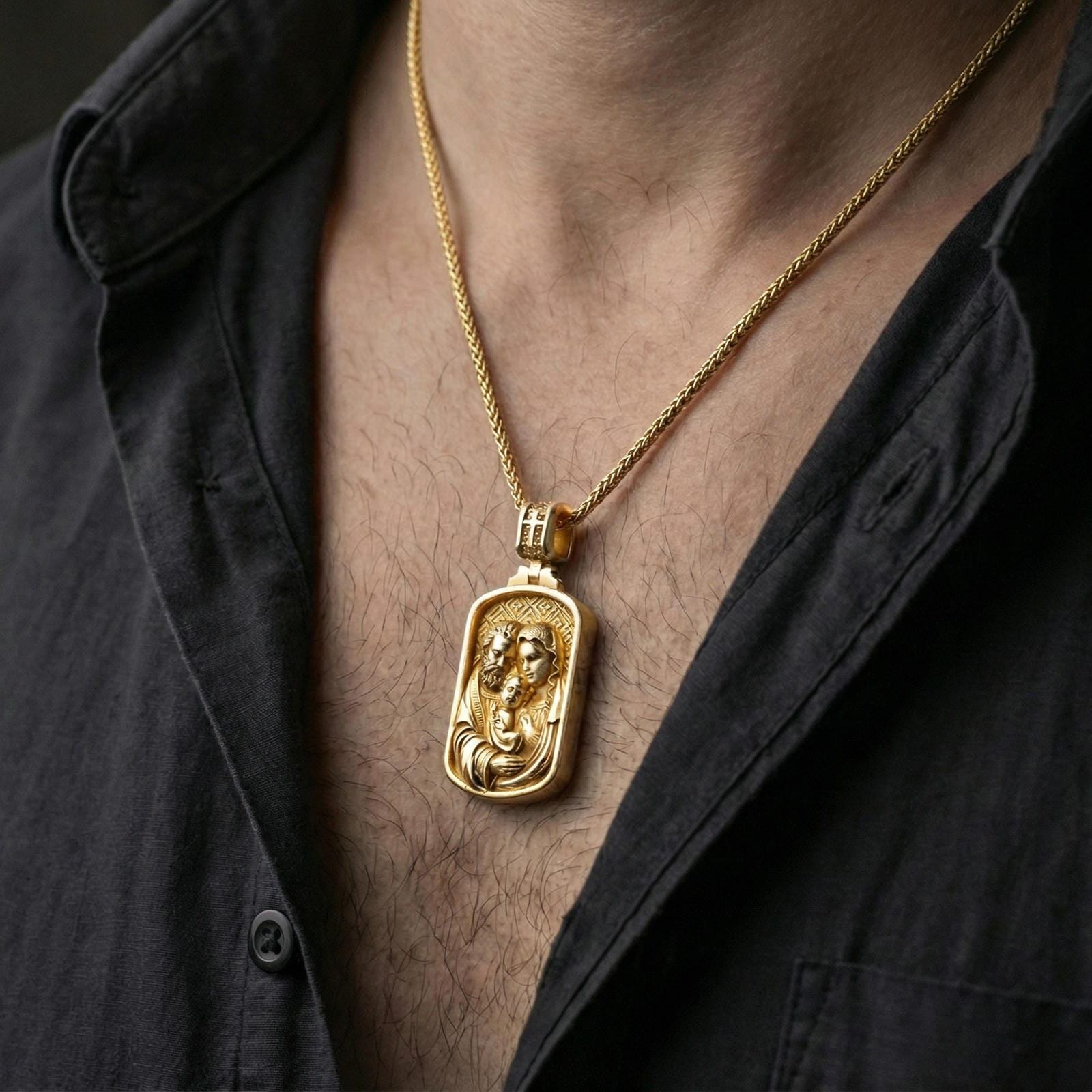Gold plated Holy Family pendant necklace worn on neck, premium lifestyle composition, rectangular devotional medallion centerpiece