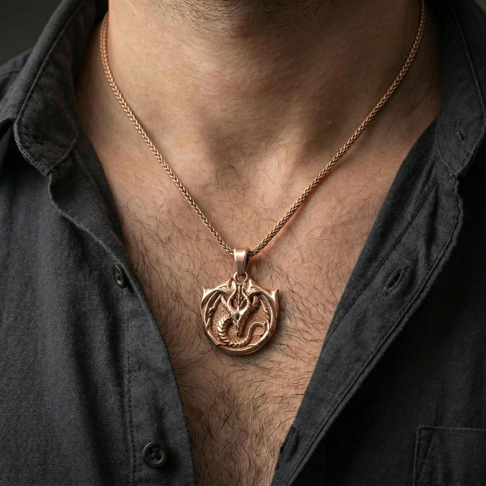 Rose gold plated dragon pendant on model, elegant fantasy warrior charm necklace with dragon crest