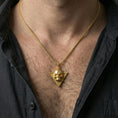 Load image into Gallery viewer, Gold plated Absolute’s talisman skull pendant worn on neck, Baldur’s Gate 3 cult amulet gift, premium lifestyle framing
