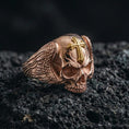 Load image into Gallery viewer, Rose gold plated skull ring with cross on volcanic stone, winged skull design, gothic Christian ring, sharp detail
