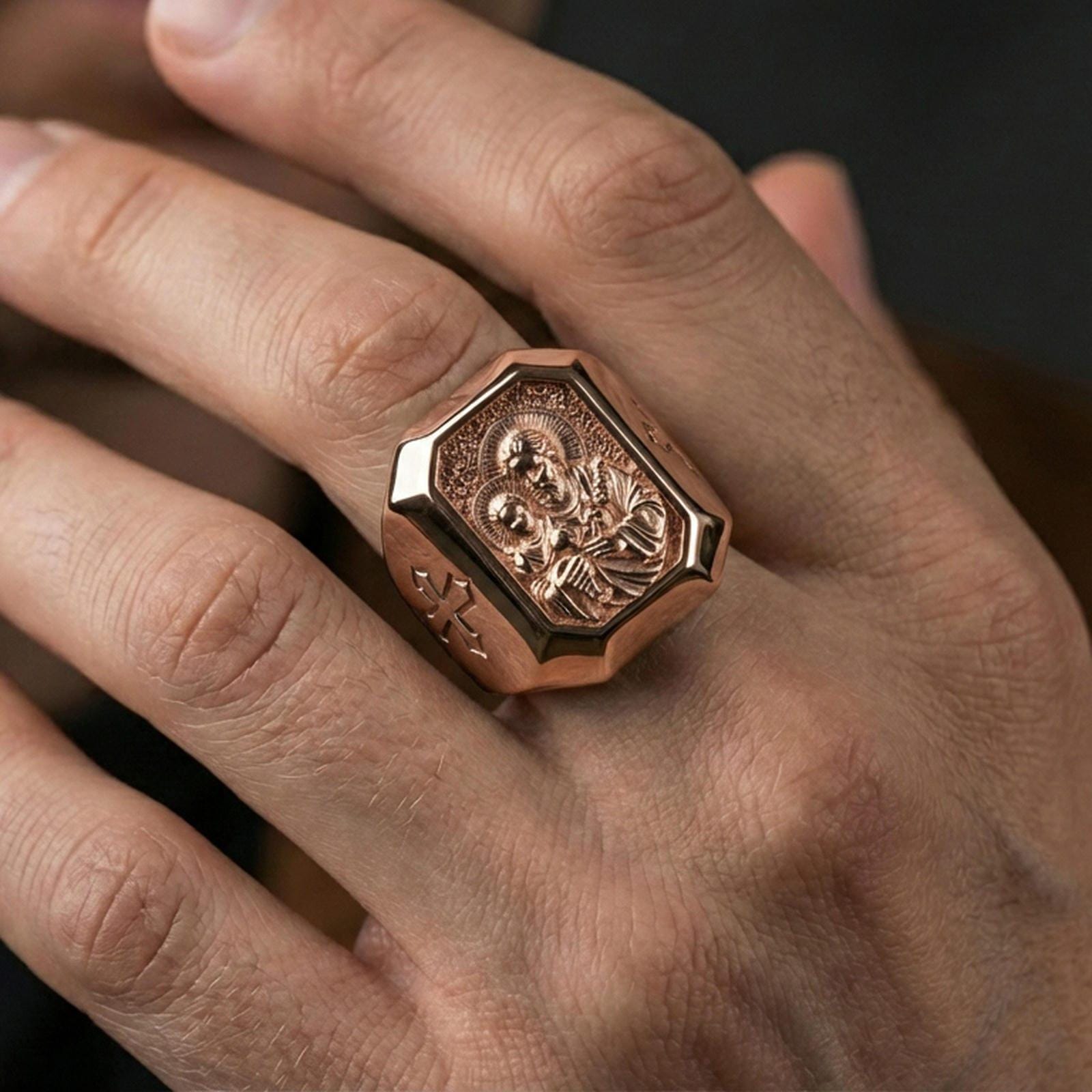 Rose gold plated St Joseph signet ring worn on finger, octagonal saint medal ring, Catholic signet jewelry lifestyle photo