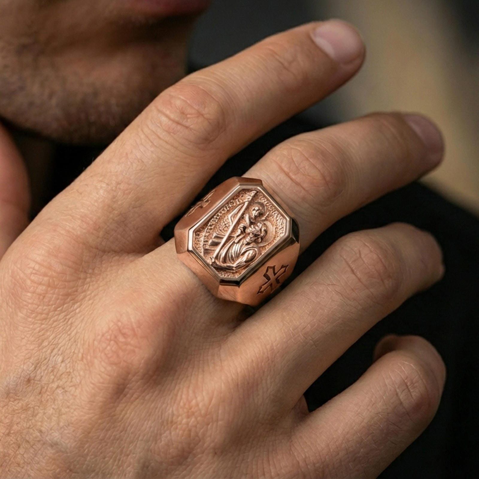 Rose gold plated St Christopher signet ring worn on finger, Saint Christopher relief ring, devotional jewelry lifestyle photo