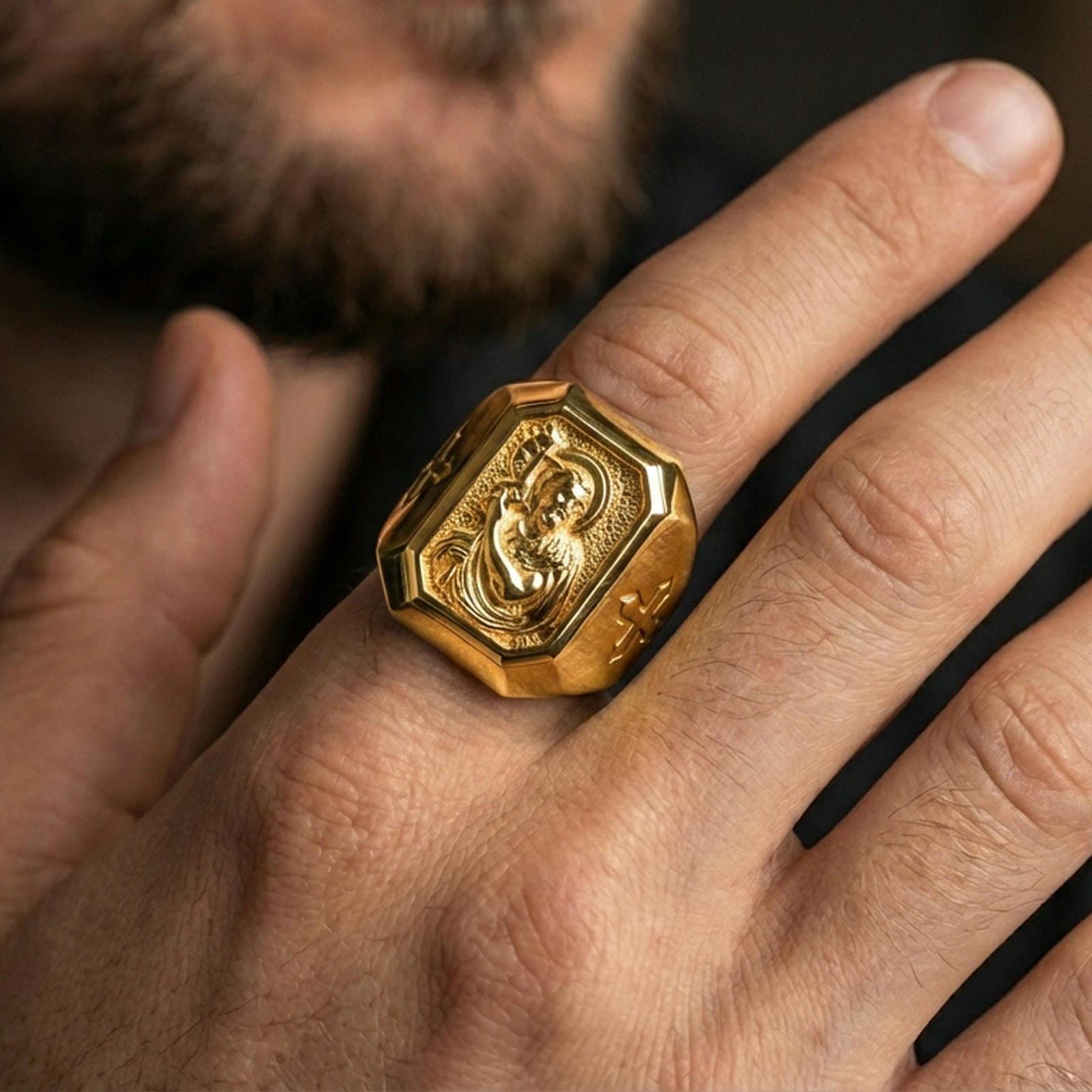 Gold plated St John the Baptist ring worn on finger, cross side detail, Christian protector signet ring