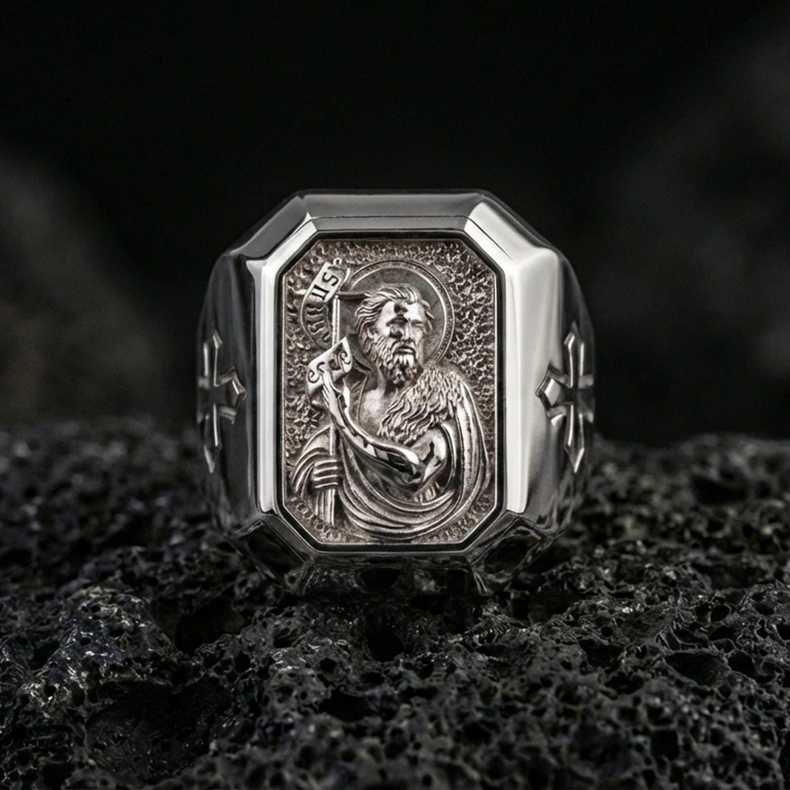 Polished silver St John the Baptist ring on porous volcanic stone, Christian saint signet, detailed halo portrait