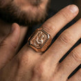 Load image into Gallery viewer, Rose gold plated St John the Baptist signet ring worn on finger, saint relief portrait, Catholic inspired jewelry
