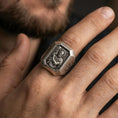Load image into Gallery viewer, Oxidized sterling silver St John the Baptist ring worn on finger, Christian saint signet, cross side view close-up
