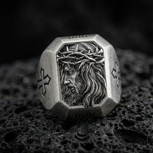 Oxidized sterling silver Jesus Christ crown of thorns ring on volcanic rock, side-profile Christ relief, cross shoulder engravings