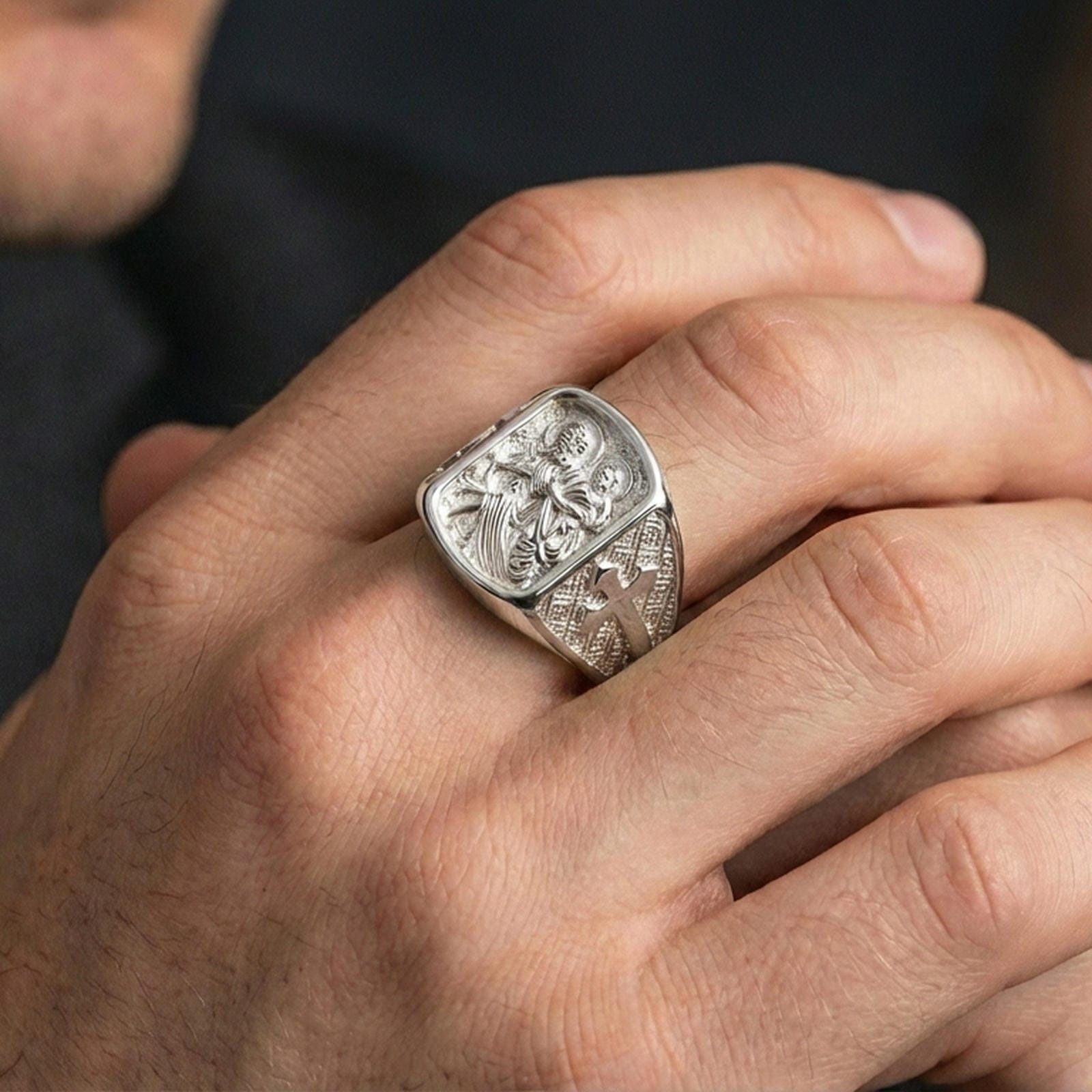 Polished silver Saint Christopher signet ring worn on finger, traveler saint engraving, meaningful gift for dad or husband