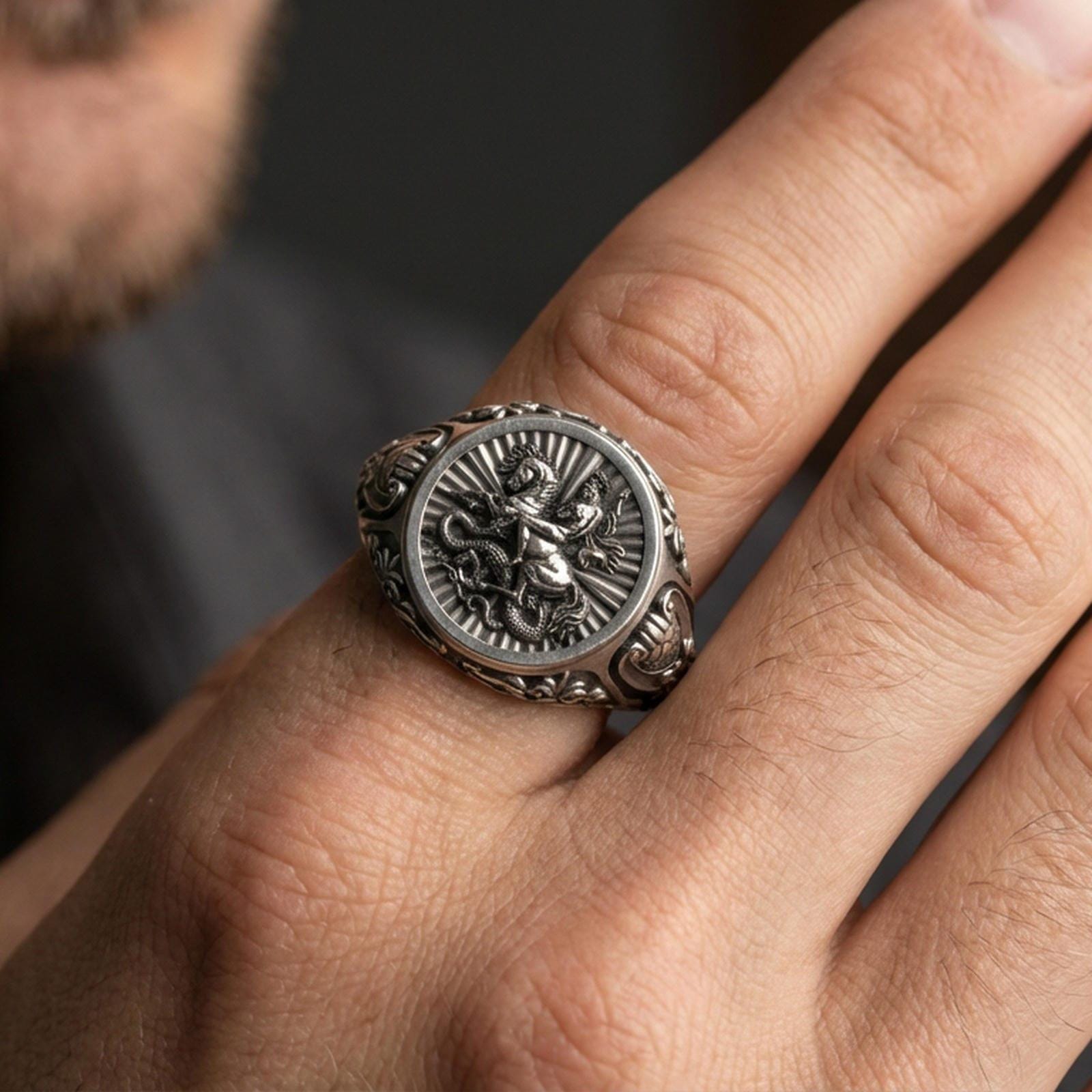 Oxidized sterling silver St George signet ring worn on finger, dragon slayer saint relief, Christian protection jewelry