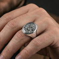 Load image into Gallery viewer, Polished silver Saint Mark ring on hand, minimalist signet style with evangelist lion symbol
