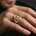 Load image into Gallery viewer, Rose gold plated Padre Pio signet ring worn on finger, religious saint portrait, meaningful Christian jewelry
