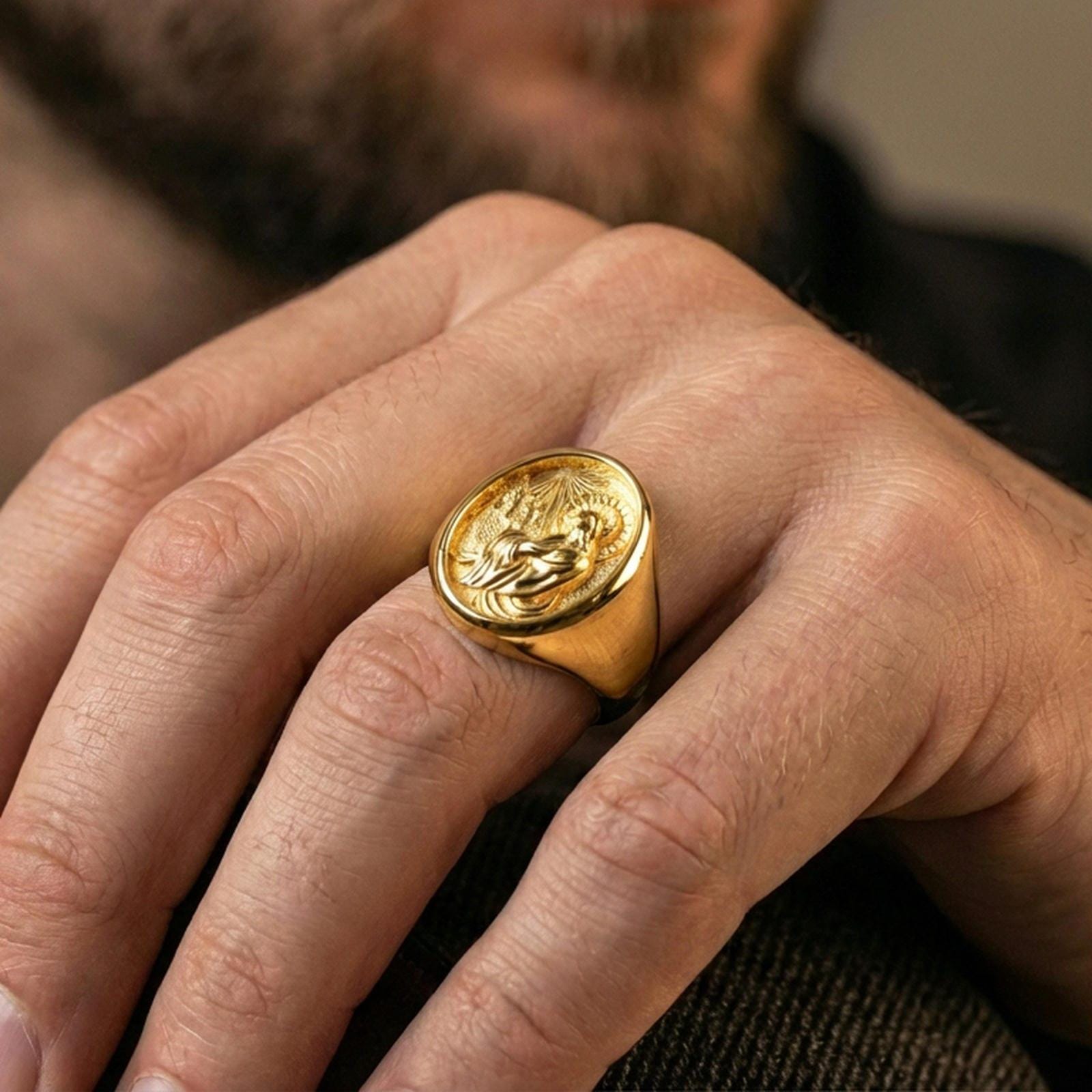 Gold plated Jesus Christ ring worn on finger, meaningful Christian gift signet jewelry