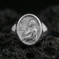 Load image into Gallery viewer, Polished silver Jesus Christ ring on volcanic stone, side profile Christ engraving closeup
