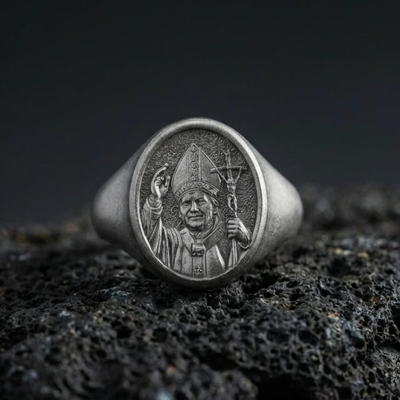 Oxidized 925 sterling silver Pope John Paul II signet ring on volcanic rock, Catholic saint portrait relief, religious jewelry