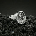 Load image into Gallery viewer, Polished silver Jesus Shepherd ring on porous volcanic stone, detailed shepherd staff engraving, religious signet ring
