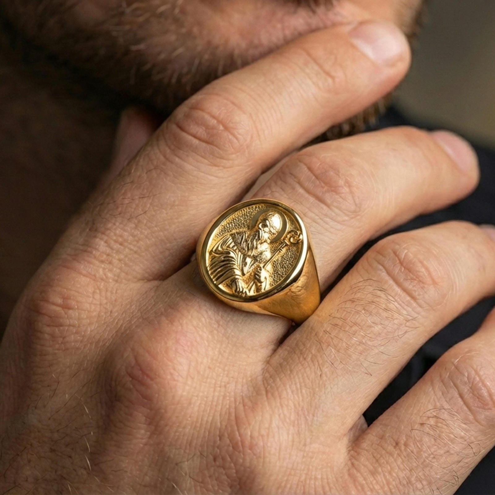 Gold plated Saint Benedict signet ring worn on finger, protective Catholic symbol jewelry, statement signet ring