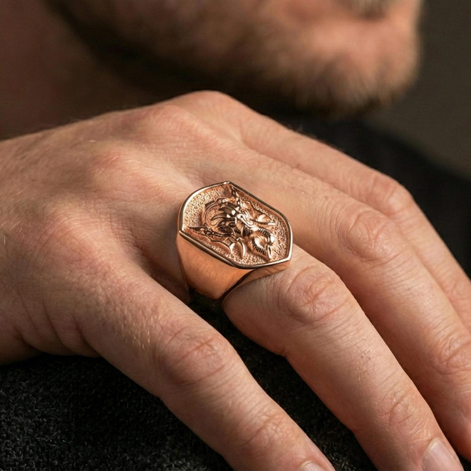 Rose gold plated Lord Ganesha signet ring worn on finger, sacred Ganesh motif, meaningful spiritual accessory