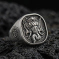 Load image into Gallery viewer, Oxidized 925 sterling silver Lord Ganesha signet ring on volcanic rock, detailed elephant head relief, Hindu amulet
