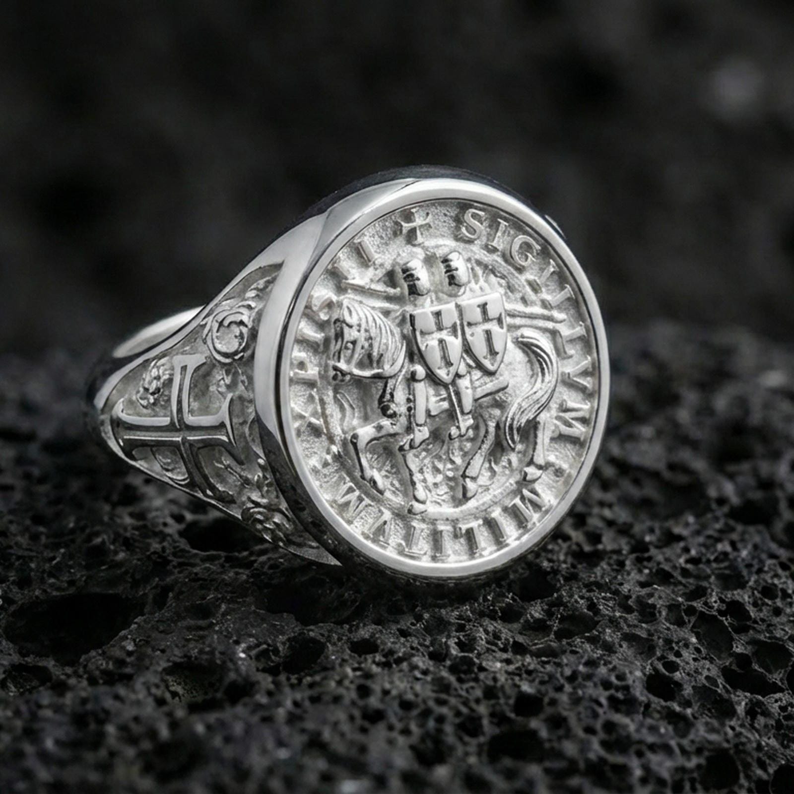 Polished silver Knights Templar ring on porous volcanic stone, Templar seal signet, medieval crusader style