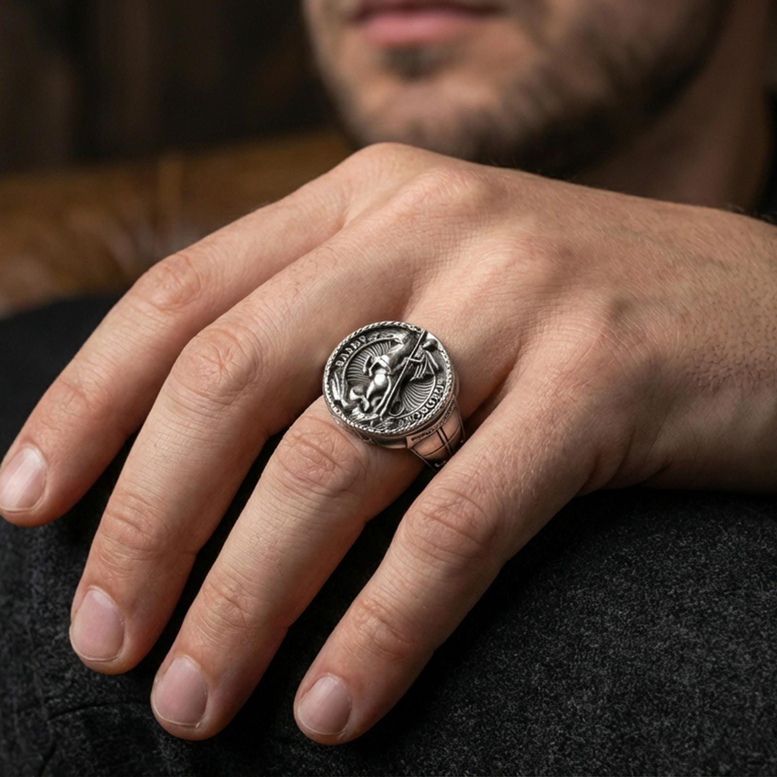 Oxidized 925 sterling silver St. George and the Dragon ring worn on finger, medieval knight signet, bold statement jewelry