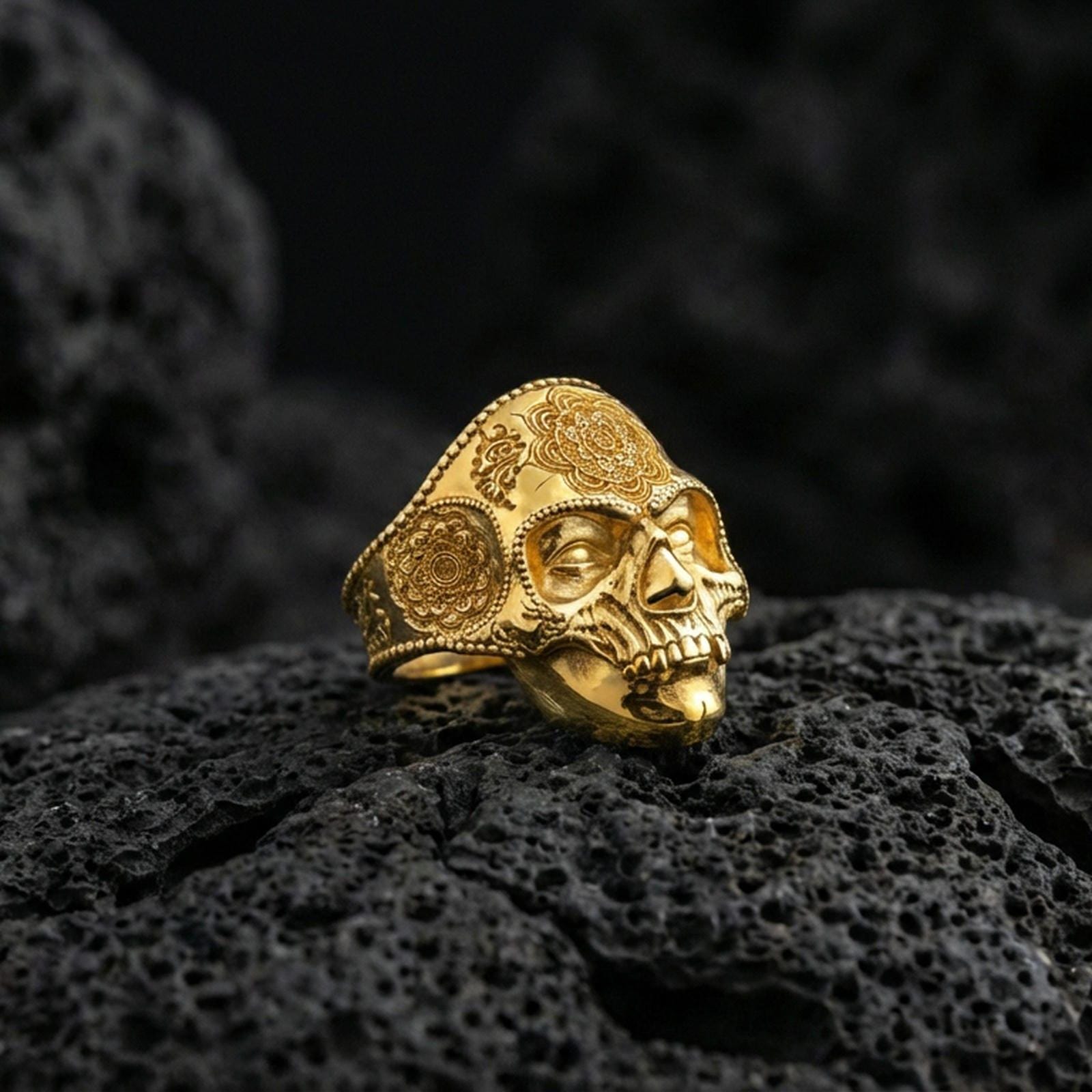 Gold plated sterling silver skull mandala ring on dark volcanic rock, spiritual mandala motif, statement ring