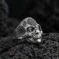 Load image into Gallery viewer, Oxidized 925 sterling silver skull mandala ring on volcanic rock, gothic memento mori statement jewelry
