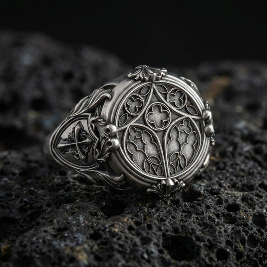 Oxidized 925 sterling silver cathedral symbol signet ring on volcanic rock, gothic stained glass inspired design