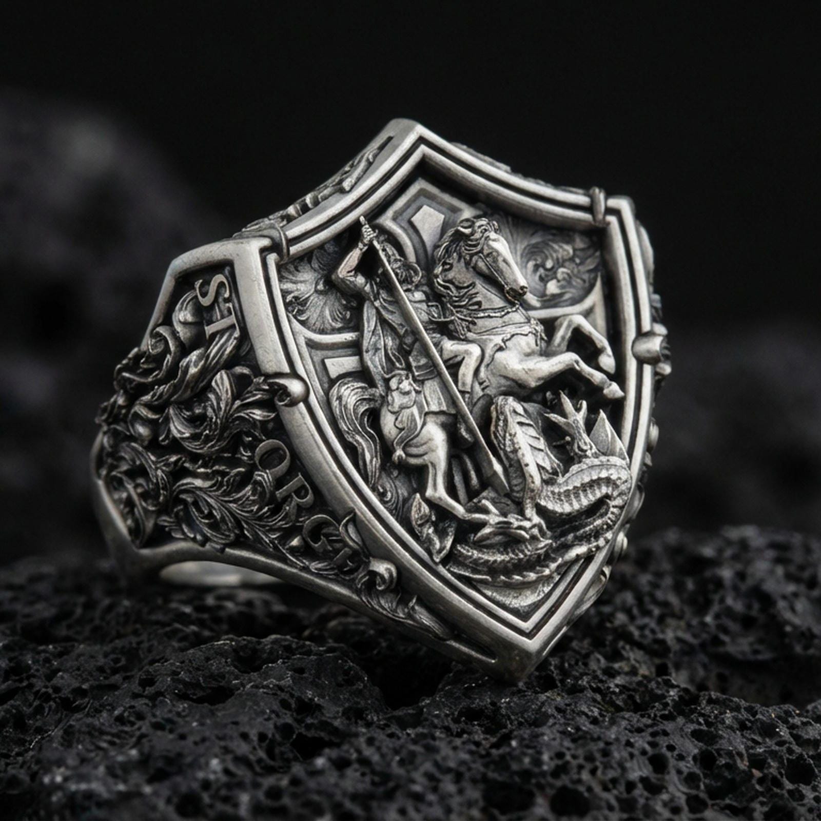 Oxidized 925 sterling silver Saint George defeating dragon ring on volcanic rock, medieval knight shield signet design