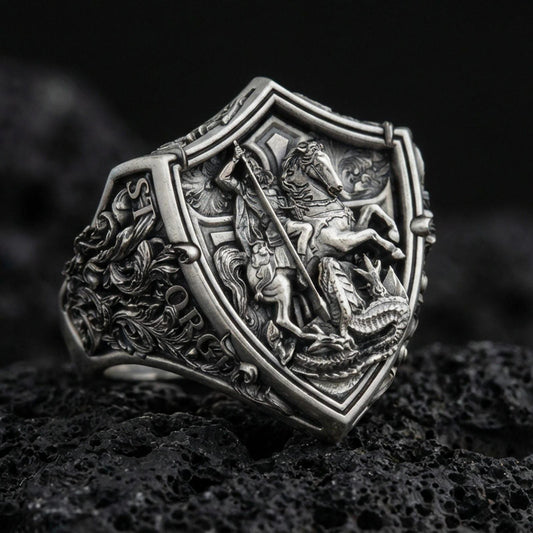 Oxidized 925 sterling silver Saint George defeating dragon ring on volcanic rock, medieval knight shield signet design