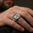 Load image into Gallery viewer, Polished silver St George knight and dragon ring worn on finger, detailed shield relief signet, statement Christian jewelry
