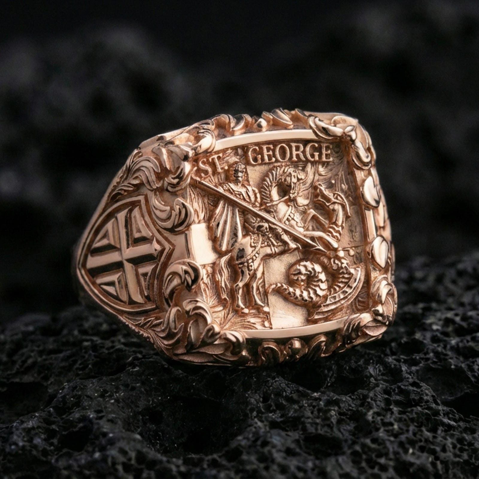 Rose gold plated St George dragon slayer signet ring on volcanic stone, ornate filigree frame, Christian knight jewelry