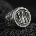 Load image into Gallery viewer, Oxidized 925 sterling silver St Michael archangel ring on volcanic rock, angel wings relief, sword and cross armor
