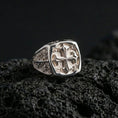 Load image into Gallery viewer, Polished silver crusader cross ring on porous volcanic stone, bold Christian symbol signet, engraved details
