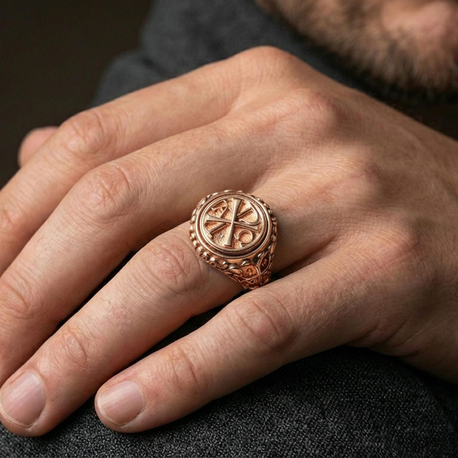 Rose gold plated Chi Rho Alpha Omega ring worn on finger, faith emblem signet, unique Christian gift ring