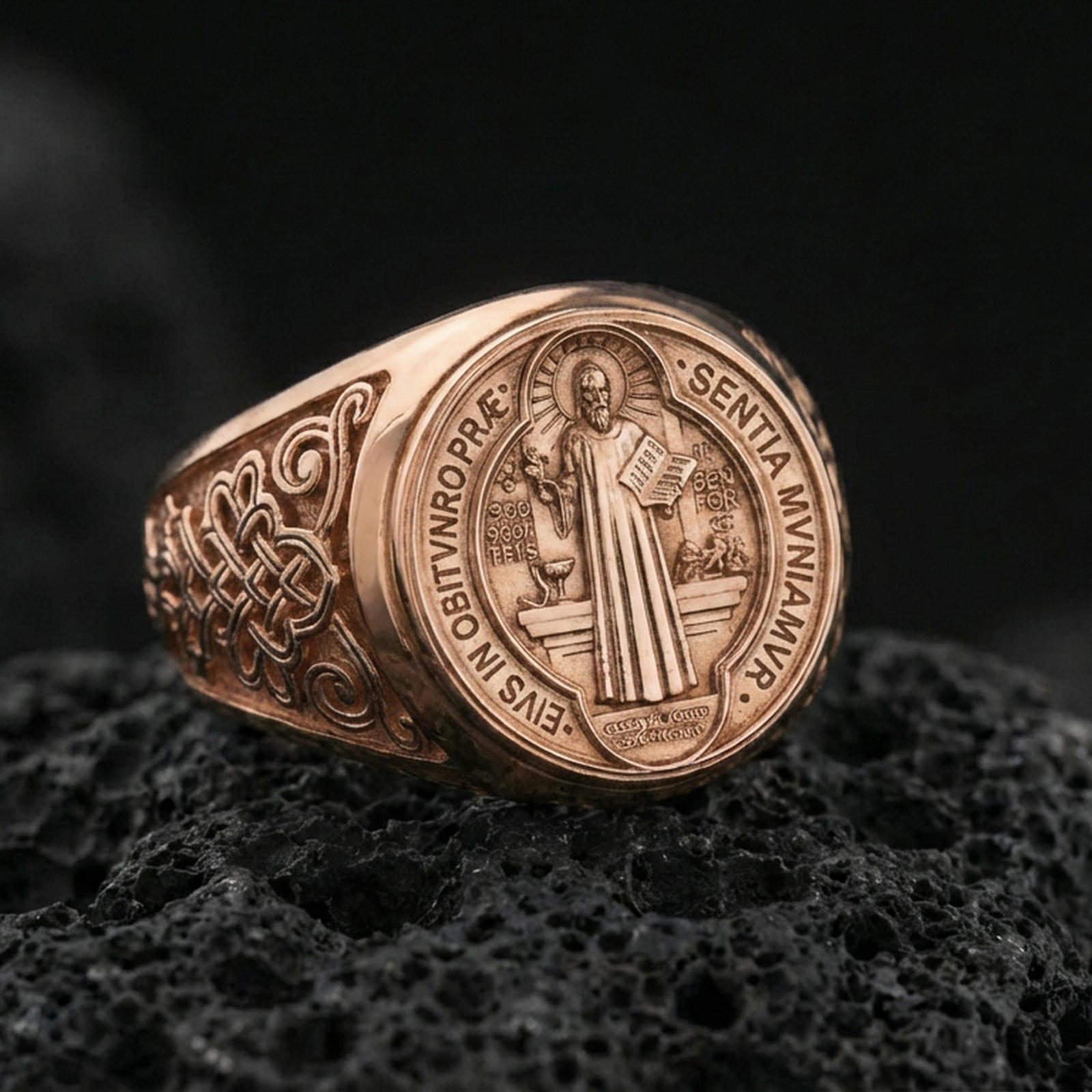 Rose gold plated St Benedict medal signet ring on volcanic stone, detailed saint and prayer inscription, devotional signet ring