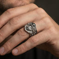 Load image into Gallery viewer, Oxidized 925 sterling silver heraldic cross shield ring worn on finger, medieval crest signet with ornate scroll band
